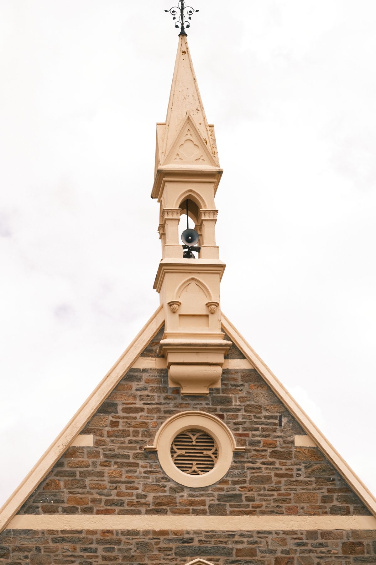 Stone church spire against the sky