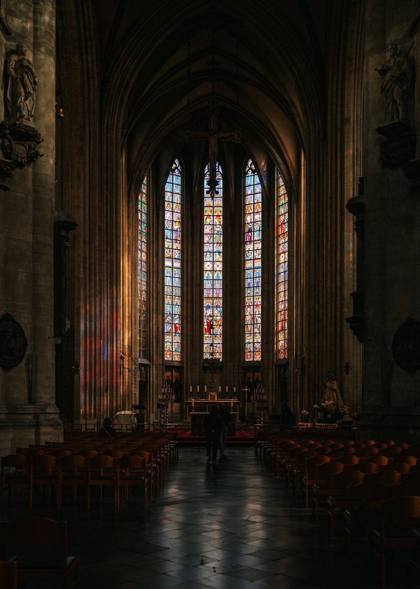 Peaceful church interior with stained glass windows